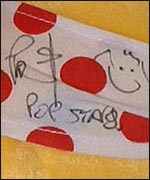 Pete Waterman's autograph on a Pudsey toy