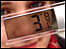 Schoolgirl with thermometer