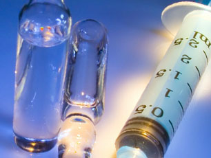 Syringe and phials (Image credit Alexandr Tovstenko/iStockphoto)