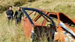 Old car wrecks are left to rust