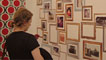 A visitor at Y Lle Celf takes in the memories from the 1977 Eisteddfod in Wrexham