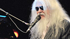 Leon Russell on piano showing the crowd why Elton admires him so much.