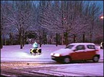 Car driving in snow