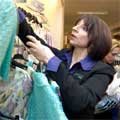 Amanda, the Fashion Adviser at John Lewis, browses the store to select some suitable clothes for Emma