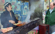 Jim eyes up the local cuisine