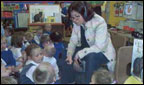 Sanchia Berg with some school children