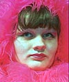 Model wearing pink feathers