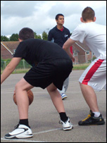 Playing basketball