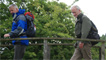 Crossing over the wooden footbridge