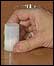 Pic: the canister upside down on a table.