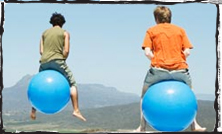 people on space hoppers