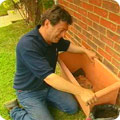 Cover the base of the pot with a layer of broken pots