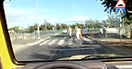 A pedestrian crossing through a windscreen 