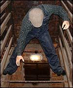 Model balances on speets in smoking shed.
