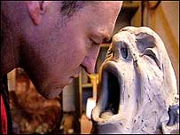 Man with sculpture