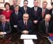 Image of Taoiseach Bertie Ahern surrounded by his cabinet after amending Articles 2 & 3 of the Irish Constitution, 2nd December 1999