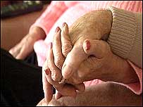 Couple hand in hand