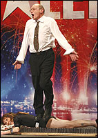 Jim stands on Joan
