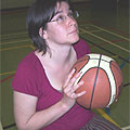Kate tries shooting a hoop