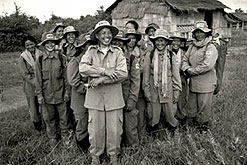 Image: Supervisor Seng Somala with her multi-skilled Mine Action Team. ©Sean Sutton/MAG