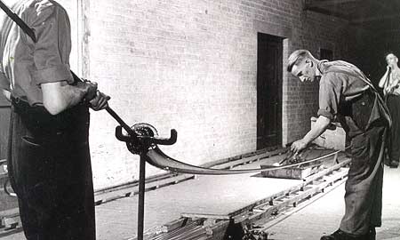 Glass being shaped