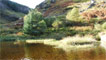 The pristine pond with waterfalls at either side.