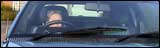 Denise struggles to see over the steering wheel!