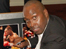 Nigel Benn signs memorablia